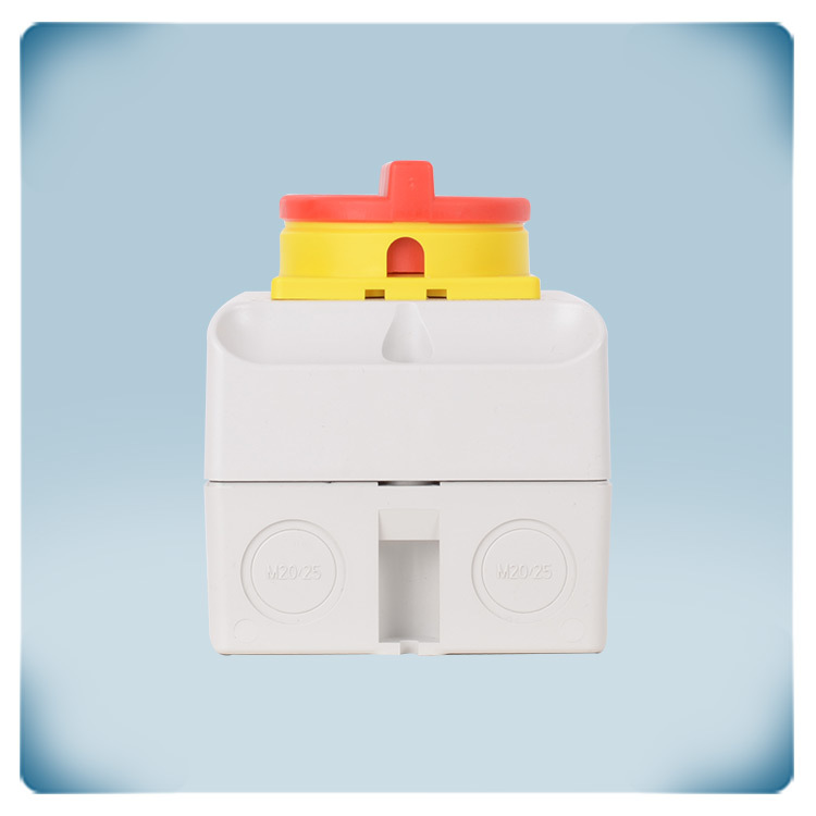 Maintenance and emergency on-off switch in light grey open enclosure