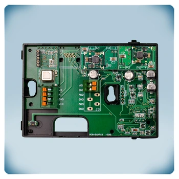 PCB with electronic components in black plastic enclosure for wall mounting