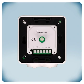 Green terminal block in black on white plastic enclosure