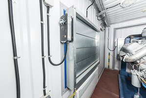 A picture of an air damper with an installed actuator