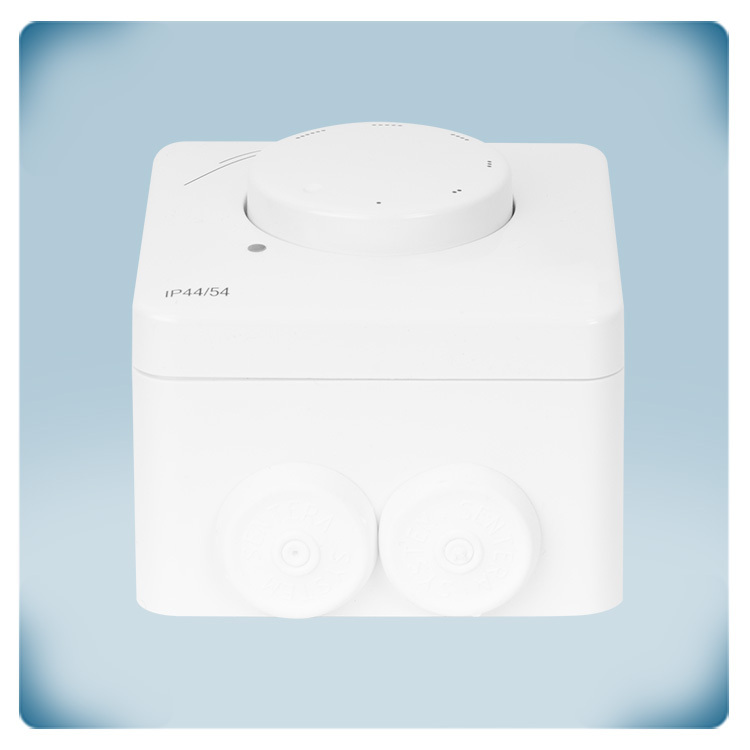Appareil électronique dans un boîtier en plastique blanc.